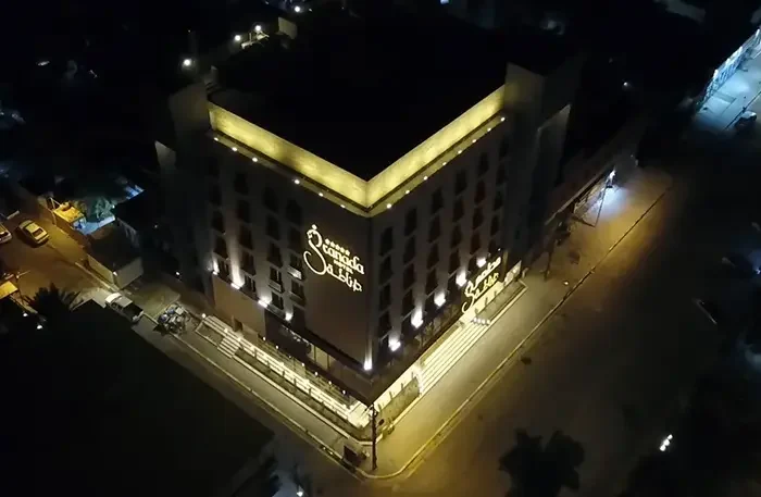 Granada Hotel Najaf exterior night view featuring architectural lighting and hotel building supplied by I-Hotel Furniture