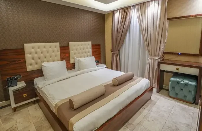 Granada Hotel Najaf hotel room furniture featuring American walnut veneer and lacquer paint manufactured by I-Hotel Furniture