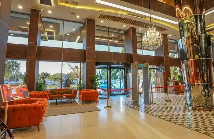 Granada Hotel Najaf lobby lounge area featuring custom armchairs, coffee tables and public area furniture supplied by I-Hotel Furniture