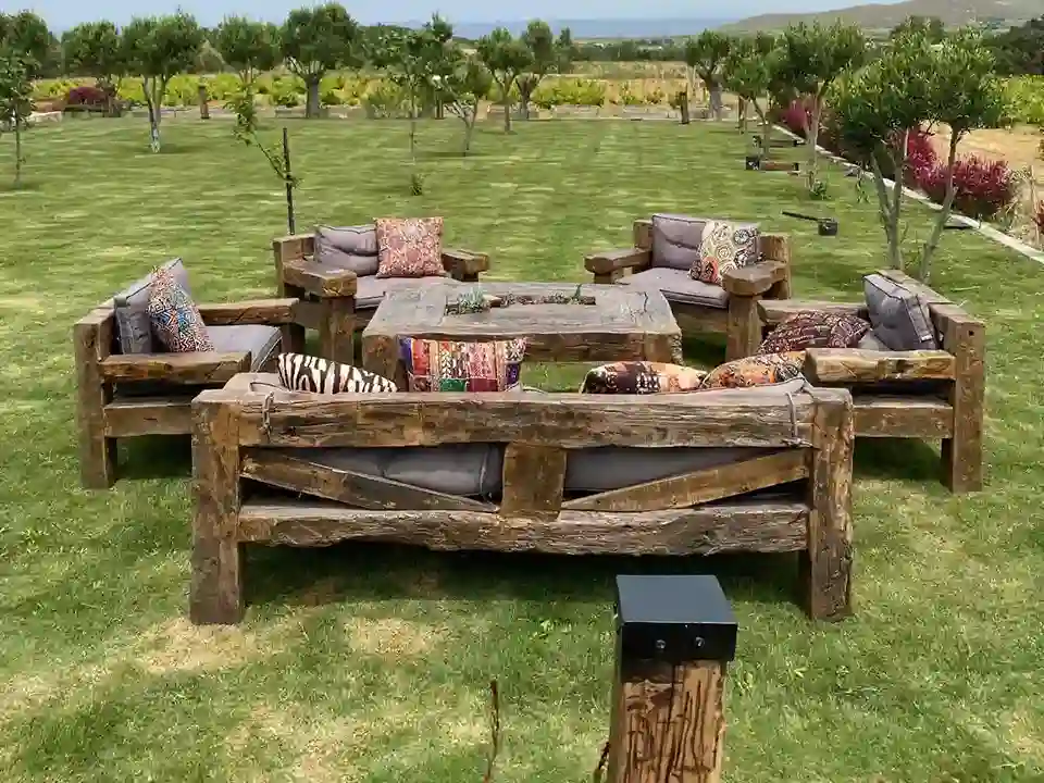Reclaimed wood lounge sofa and armchairs for resort and hospitality terrace settings