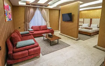 Sapelli veneer hotel suite furniture, lacquer finishes and cafe lounge seating at Granada Hotel in Najaf, Iraq
