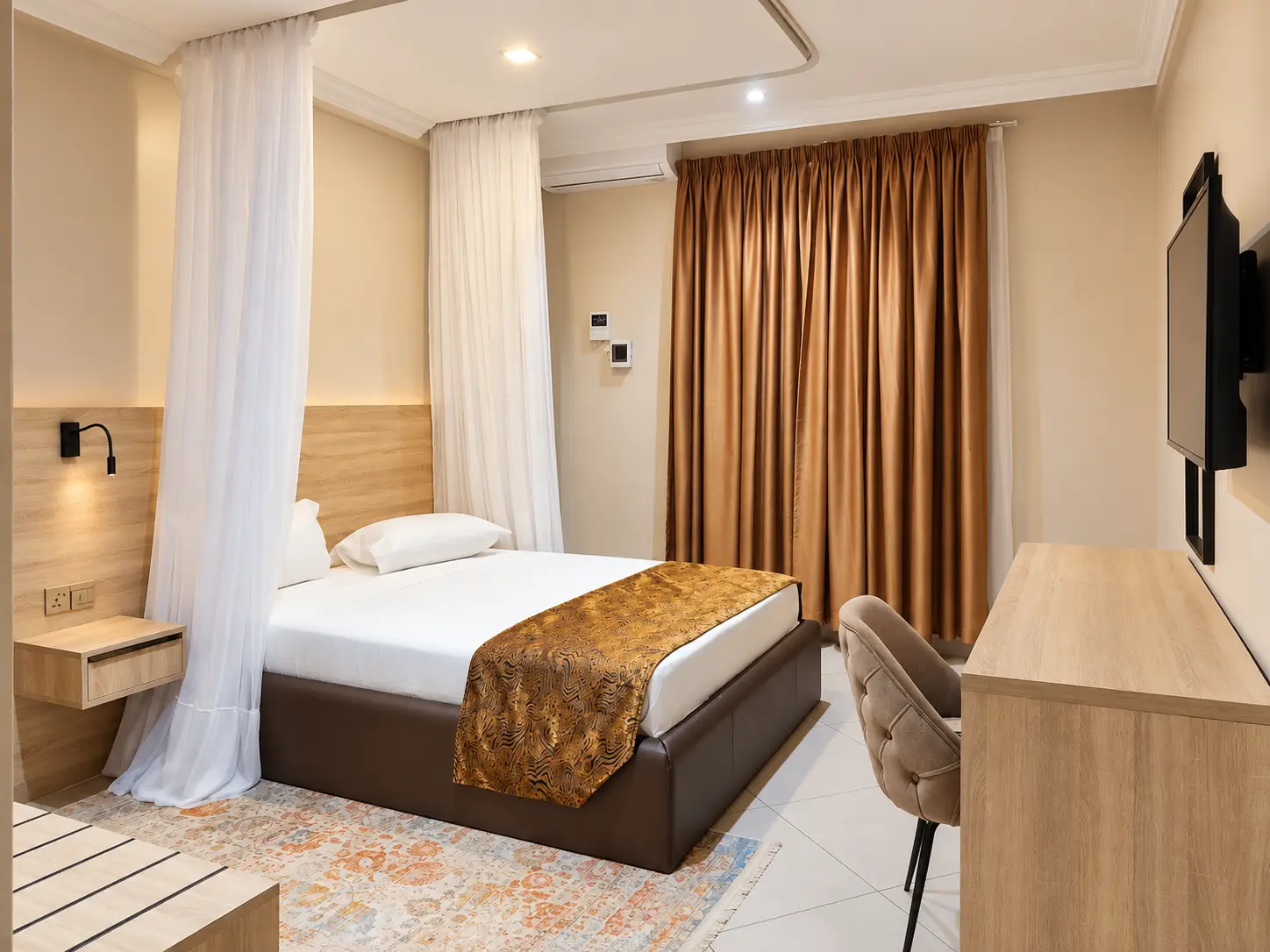 Custom hotel headboard and bedroom furniture at Grand Oasis Hotel Wajir Kenya