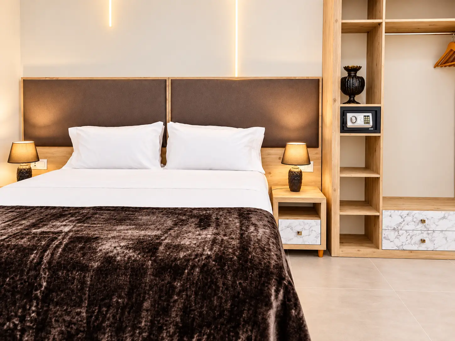Hotel headboard and bedside furniture at The Mike Hotel Malta