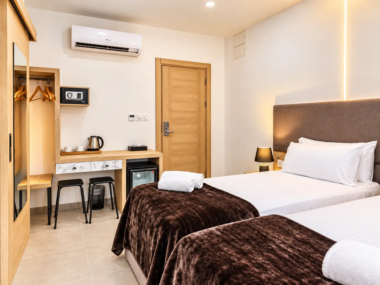 Twin guest room furniture at The Mike Hotel Malta